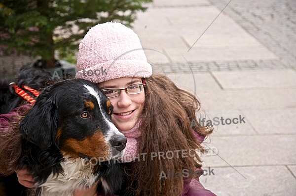 Young Girl with Bernese Mountain Dog