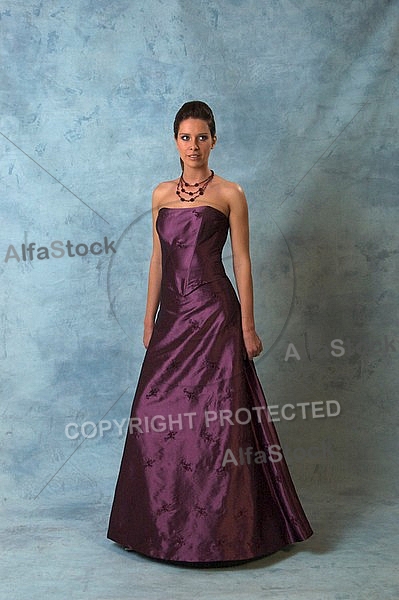 Woman standing in purple dress