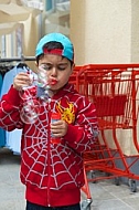 Boy with red spiderman sweater