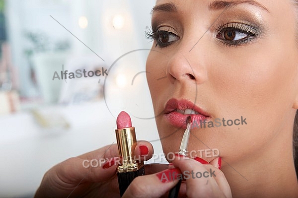 Young girl in a makeup studio